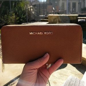 Michael Kors Jet Set style brown leather wallet